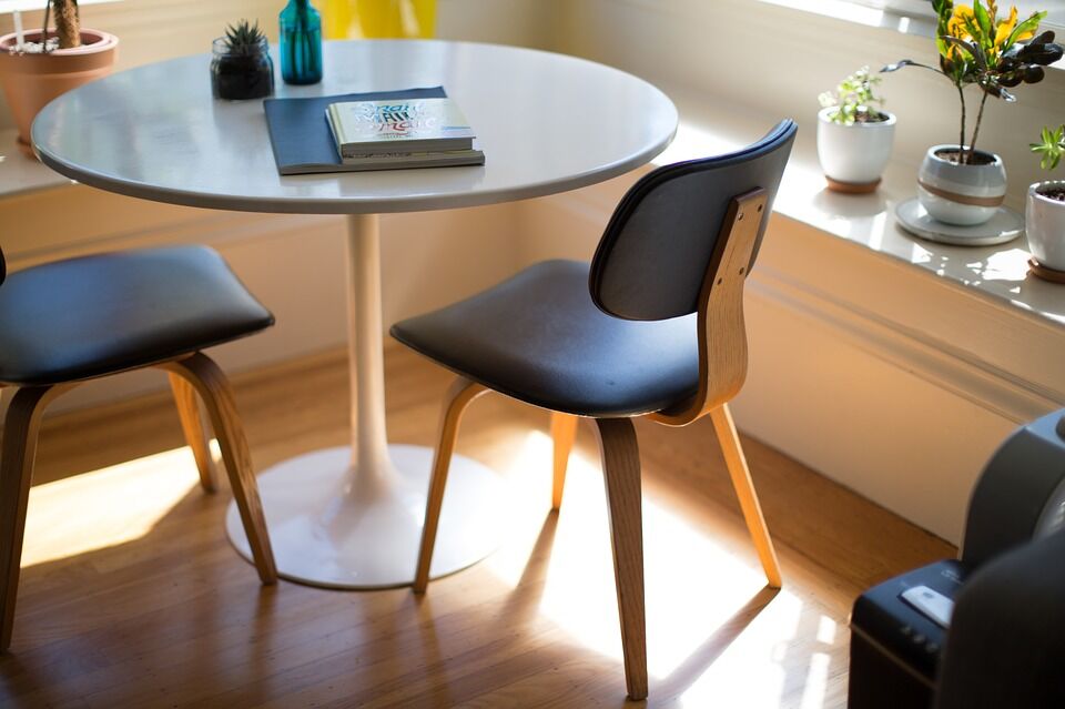 Wooden chair with black backing